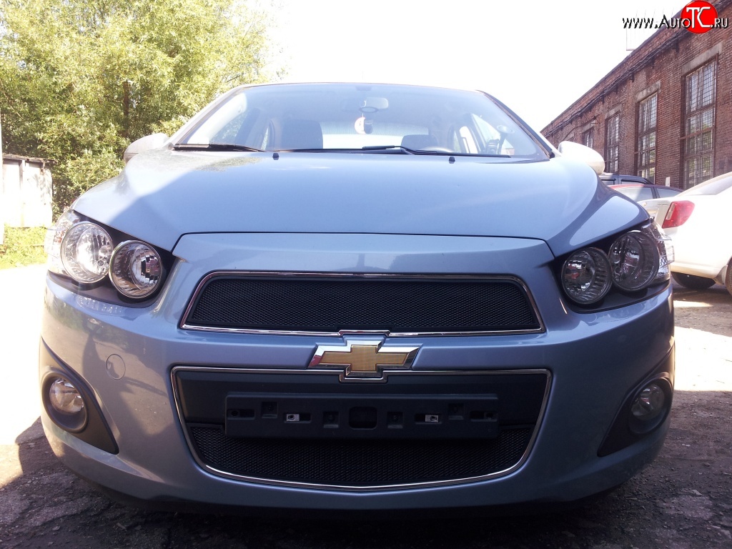 1 469 р. Нижняя сетка на бампер Russtal (черная)  Chevrolet Aveo  T300 (2011-2015) седан, хэтчбек  с доставкой в г. Йошкар-Ола