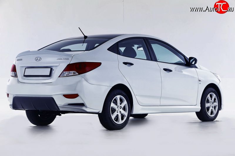 14 499 р. Задний бампер Sport Hyundai Solaris RBr седан дорестайлинг (2010-2014) (Неокрашенный)  с доставкой в г. Йошкар-Ола