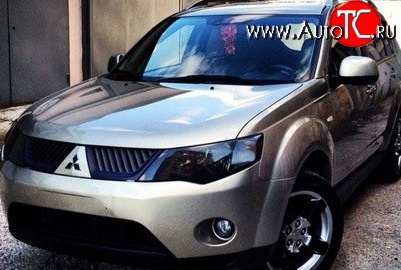 1 529 р. Темная защита передних фар SIM Mitsubishi Outlander XL (CW)  дорестайлинг (2005-2009)  с доставкой в г. Йошкар-Ола