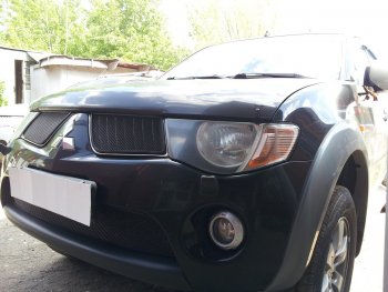 3 779 р. Защитная сетка в бампер (низ, ячейка 3х7 мм) Alfeco Стандарт  Mitsubishi L200  4 (2006-2014)  дорестайлинг (Чёрная)  с доставкой в г. Йошкар-Ола. Увеличить фотографию 2